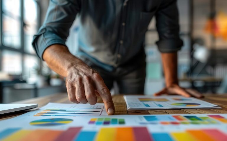 Businessman showcasing brand development strategies with creative marketing visuals, brand building